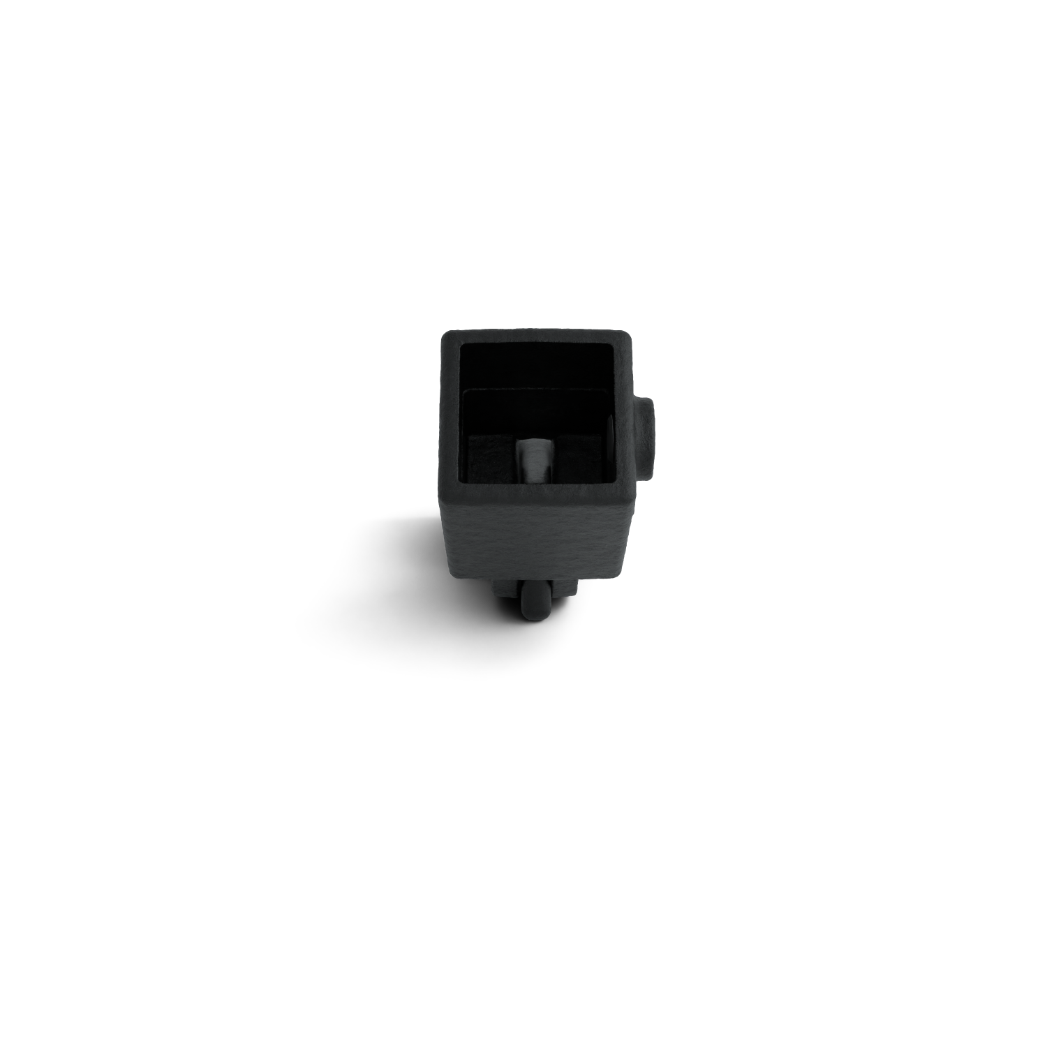 A dark, square plastic or metal component on a white background, viewed slightly from above at an angle. Open, hollow top with a small cylindrical pin in the centre. Two round protrusions at the bottom. A shadow at the bottom left.